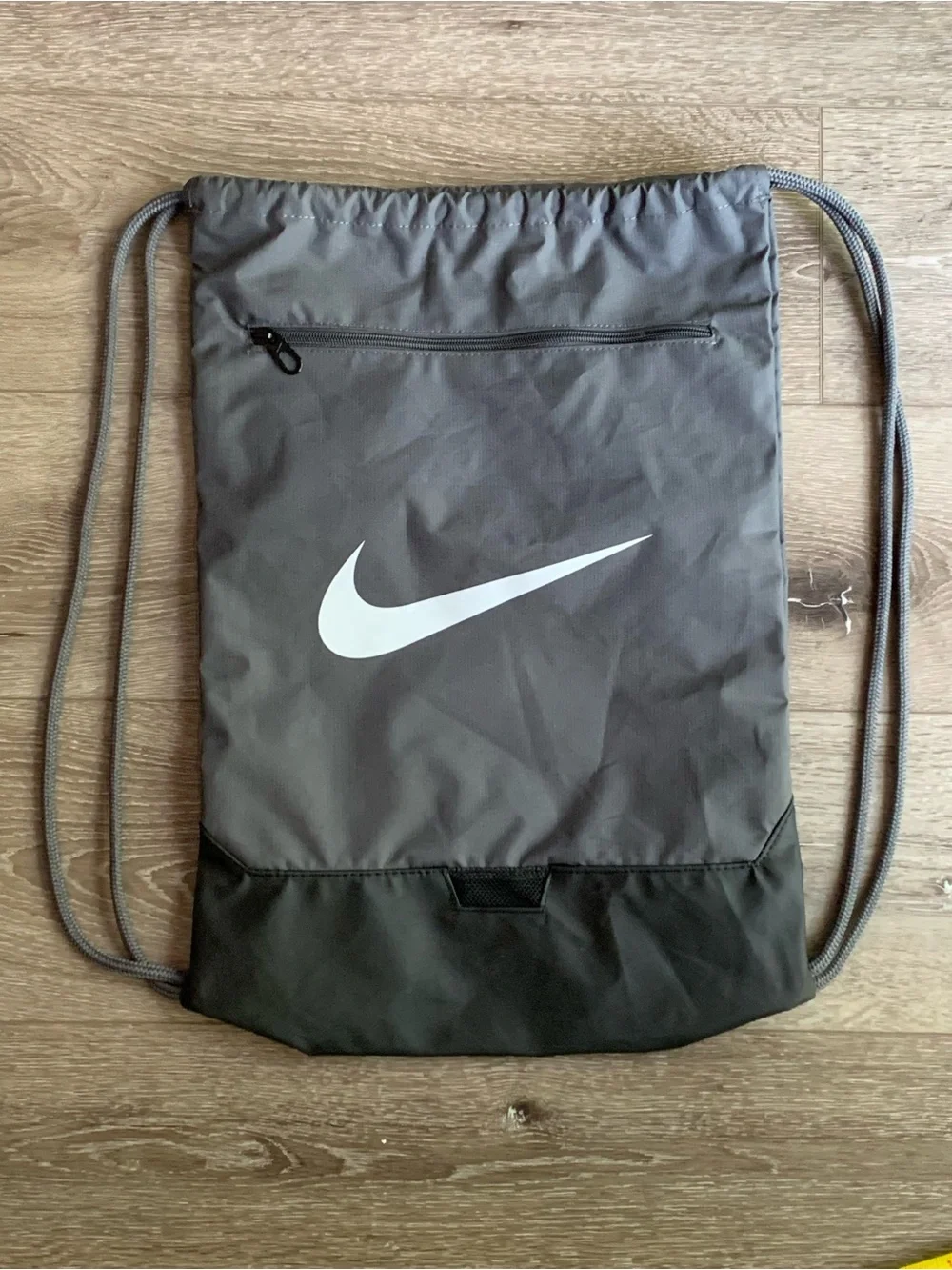 Nike Gray Drawstring Backpack with White Swoosh